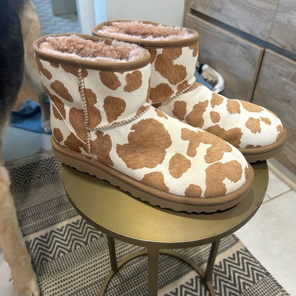 Cow print UGG boots.